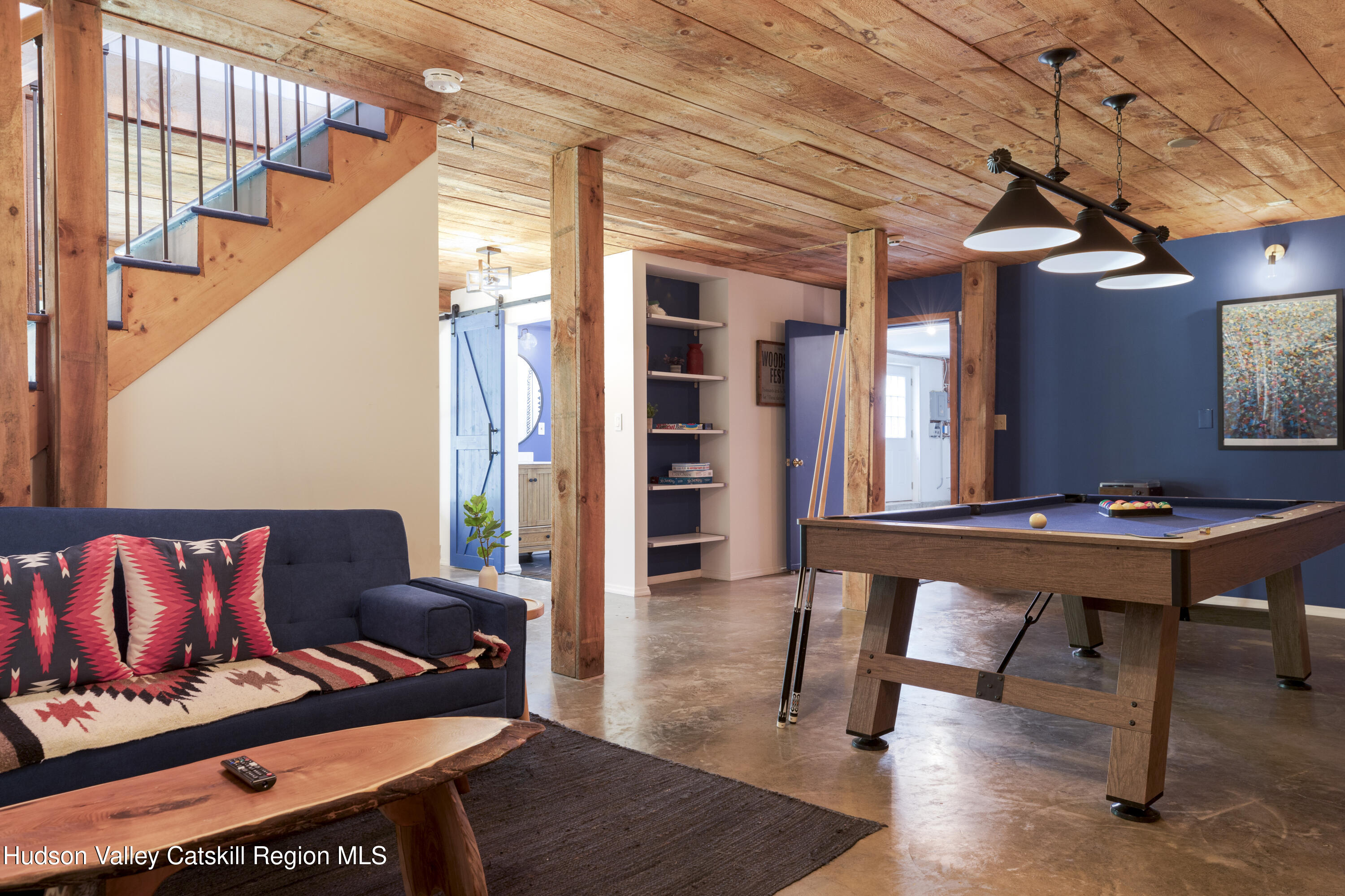 31 Joy Ridge Saugerties, NY 12477 - Photo 23 of 39 a living room with furniture a rug and a window