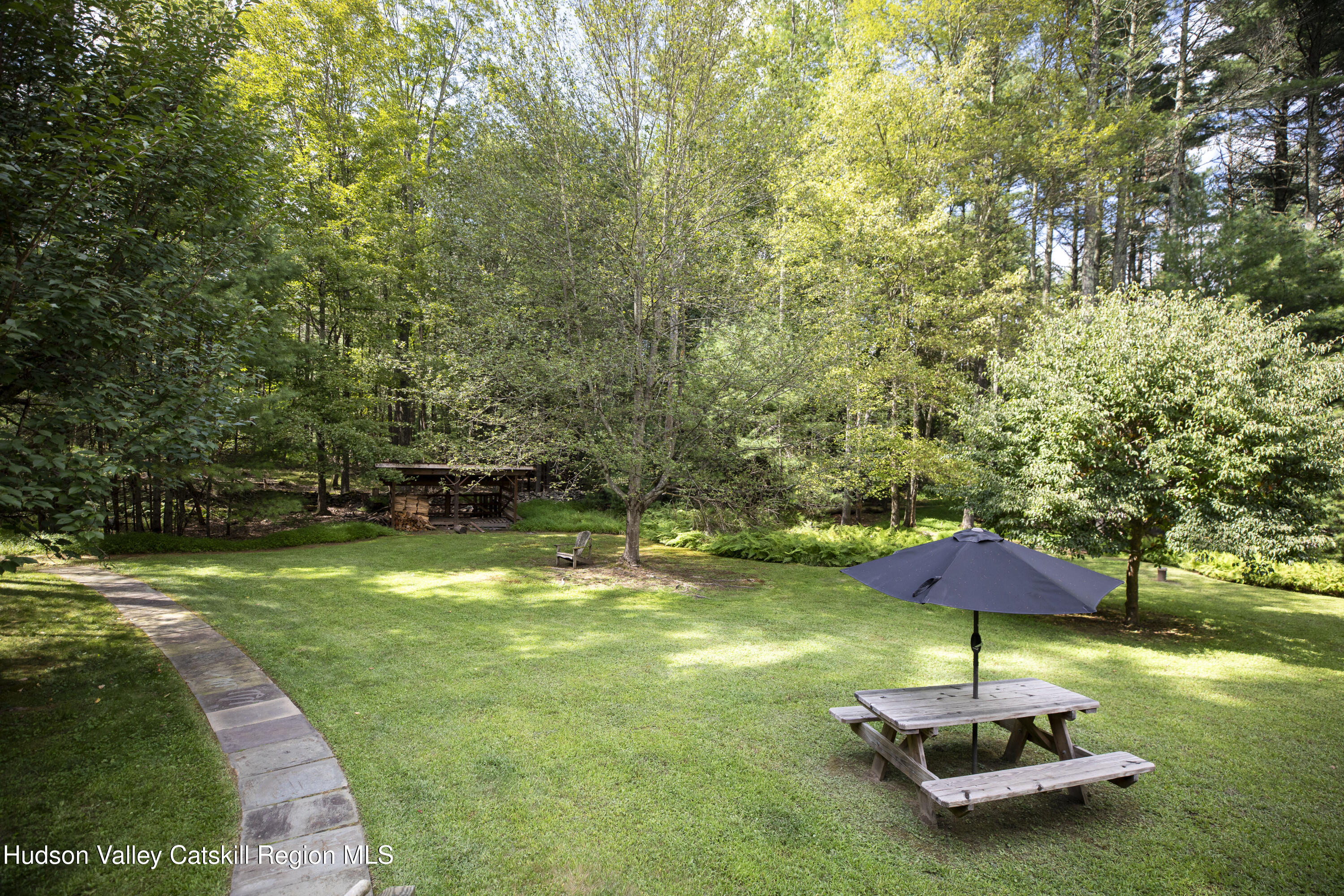 31 Joy Ridge Saugerties, NY 12477 - Photo 29 of 39 a swimming pool with wooden fence