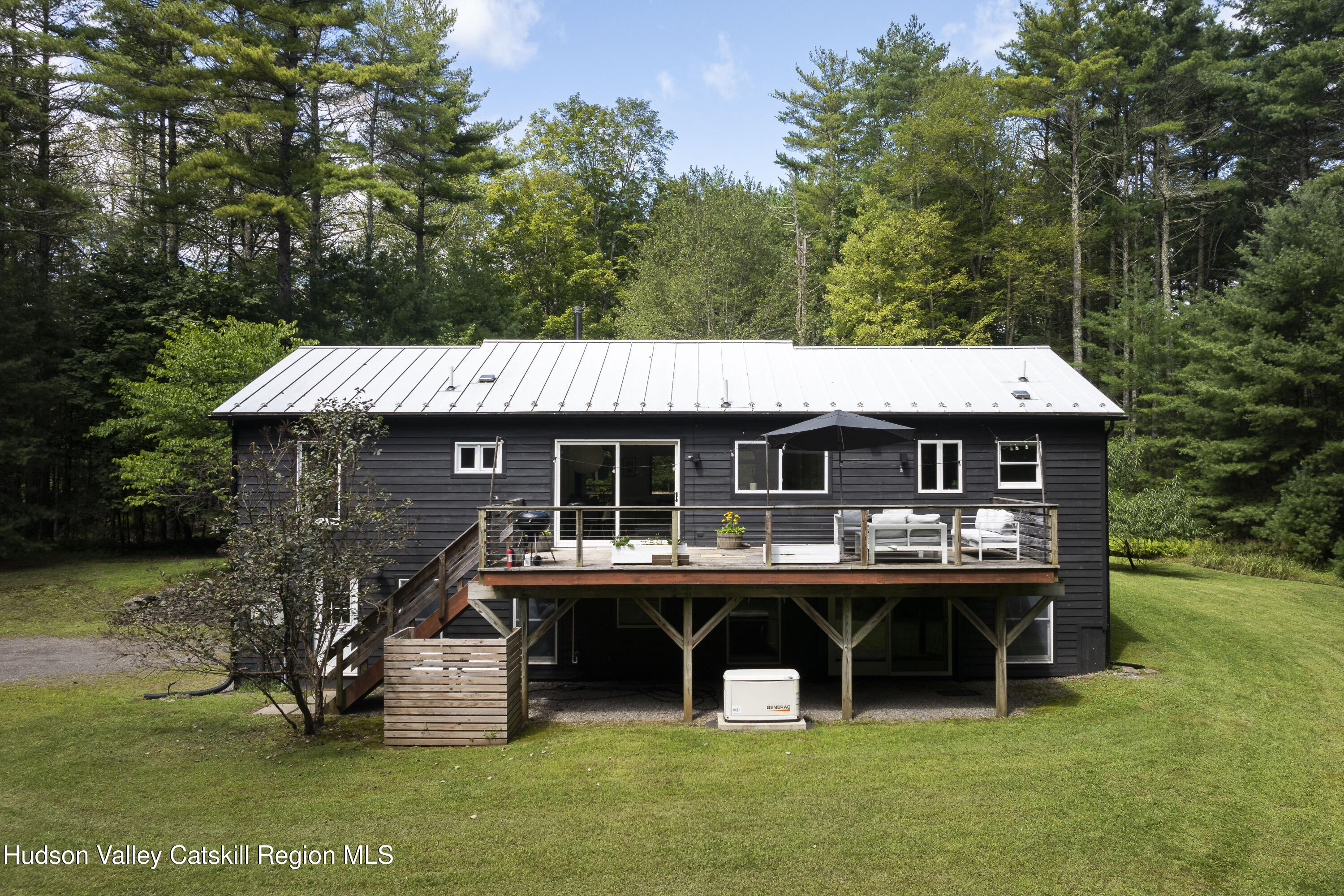 31 Joy Ridge Saugerties, NY 12477 - Photo 30 of 39 a view of a house with a sink and sitting area
