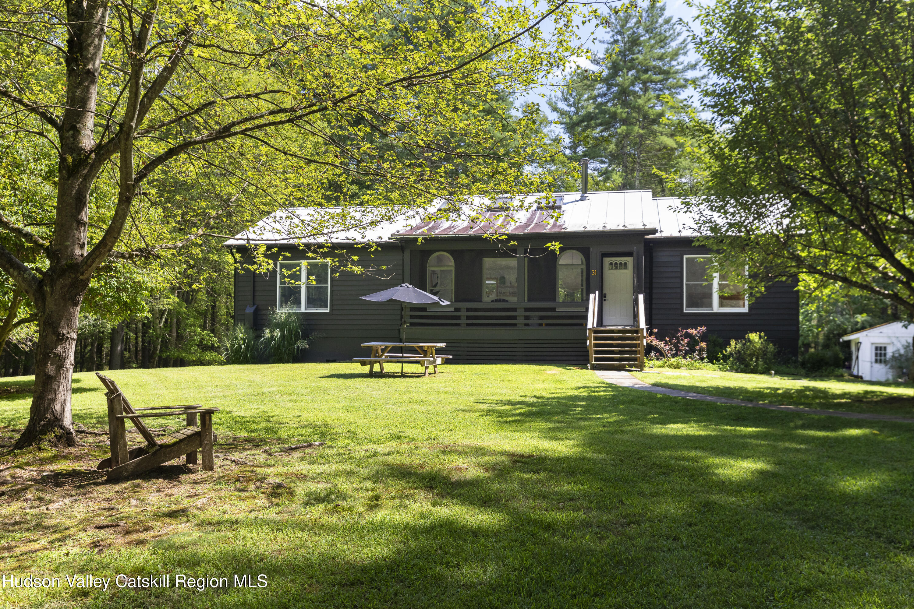 31 Joy Ridge Saugerties, NY 12477 - Photo 39 of 39 a view of a house with backyard and sitting area