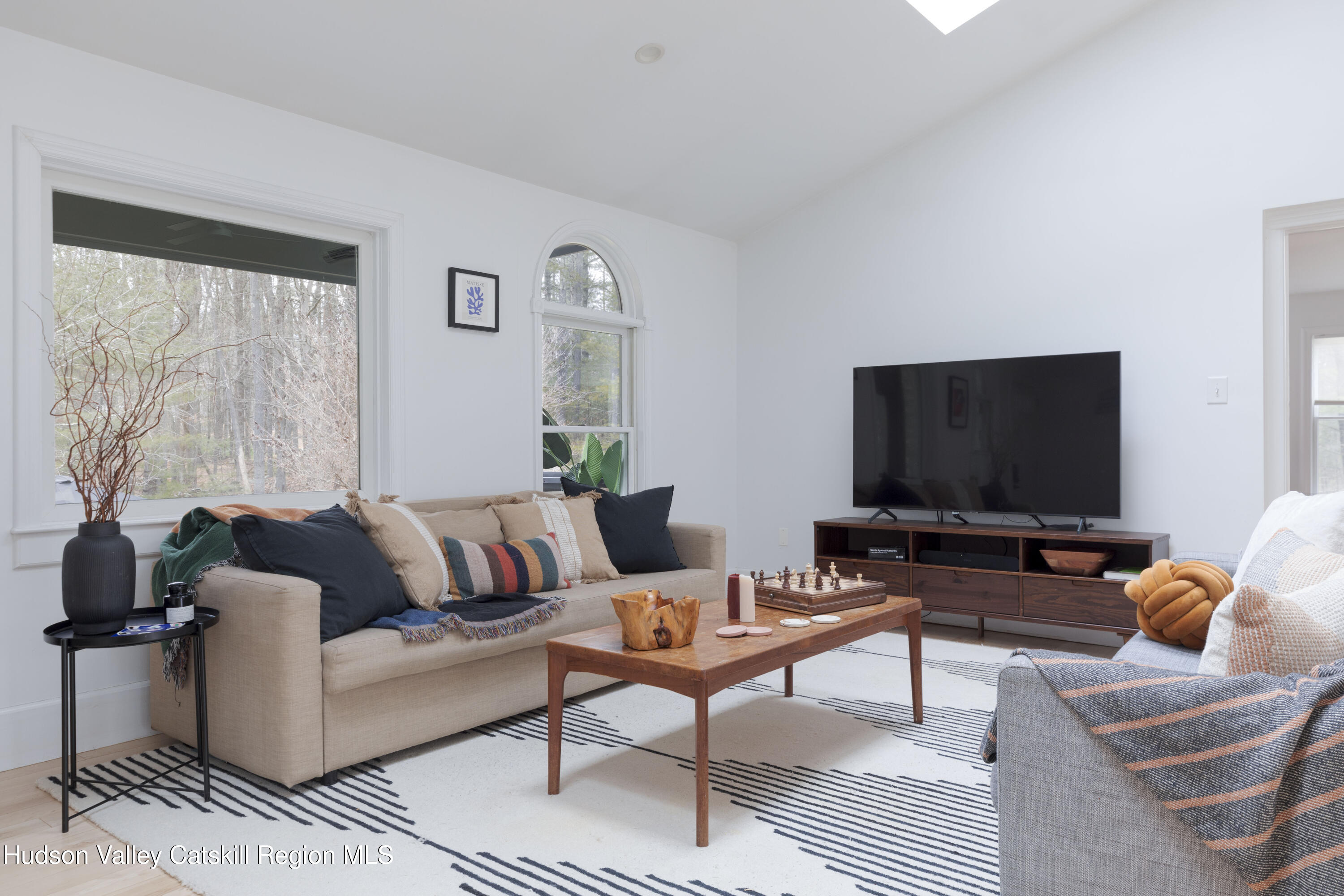 31 Joy Ridge Saugerties, NY 12477 - Photo 4 of 39 a living room with furniture and a flat screen tv