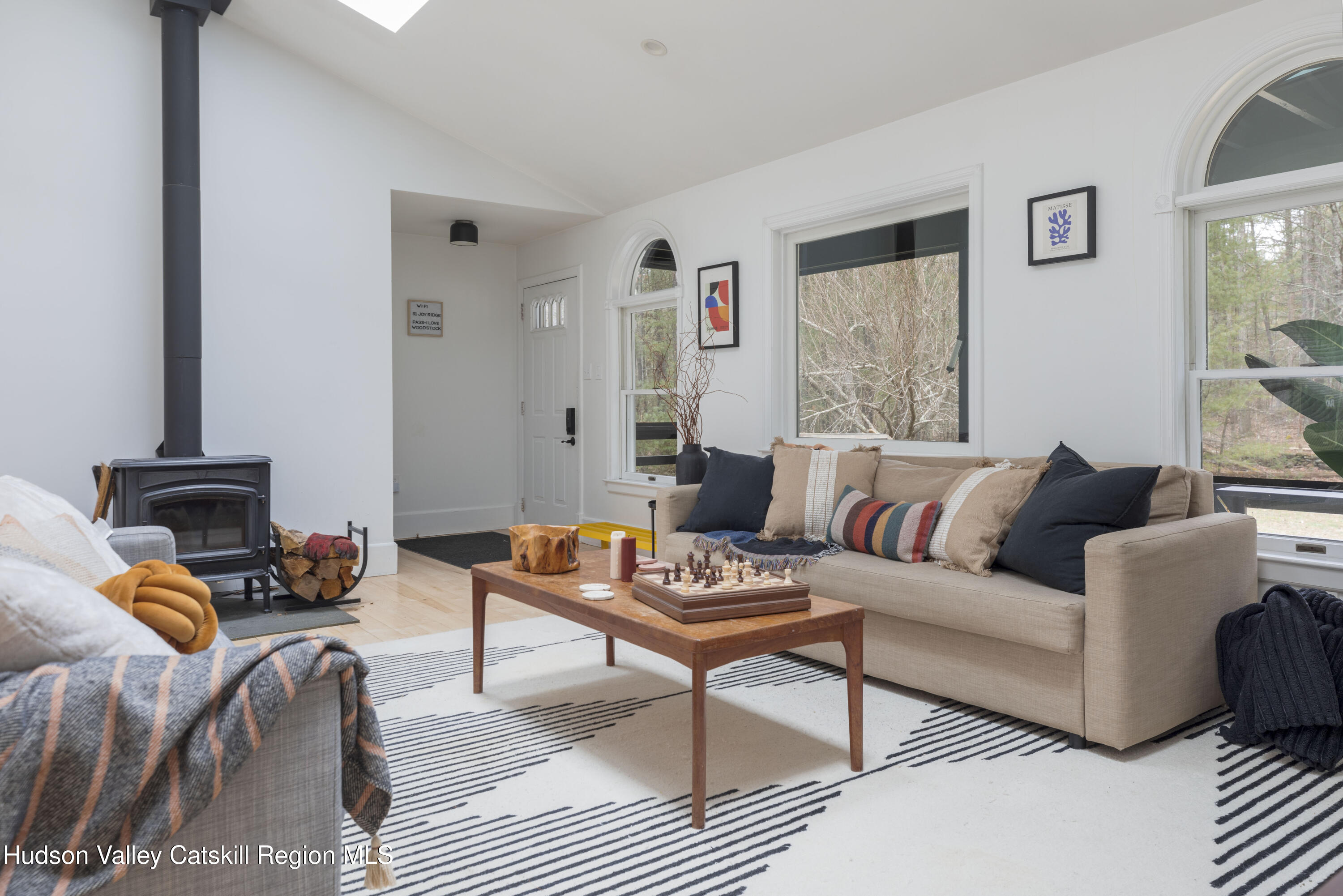 31 Joy Ridge Saugerties, NY 12477 - Photo 6 of 39 a living room with furniture and a lamp