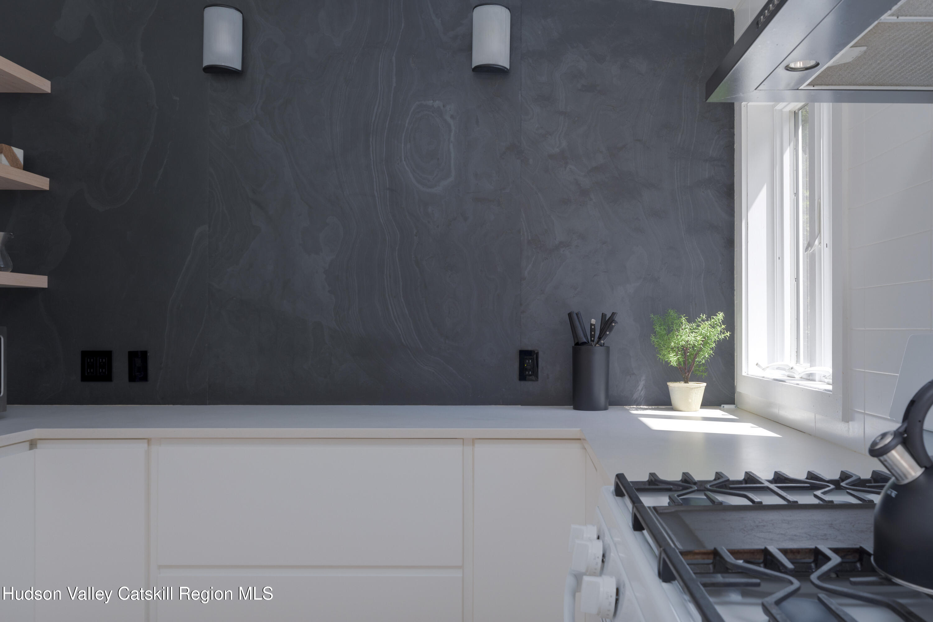 31 Joy Ridge Saugerties, NY 12477 - Photo 9 of 39 a bathroom with a granite countertop sink and a mirror
