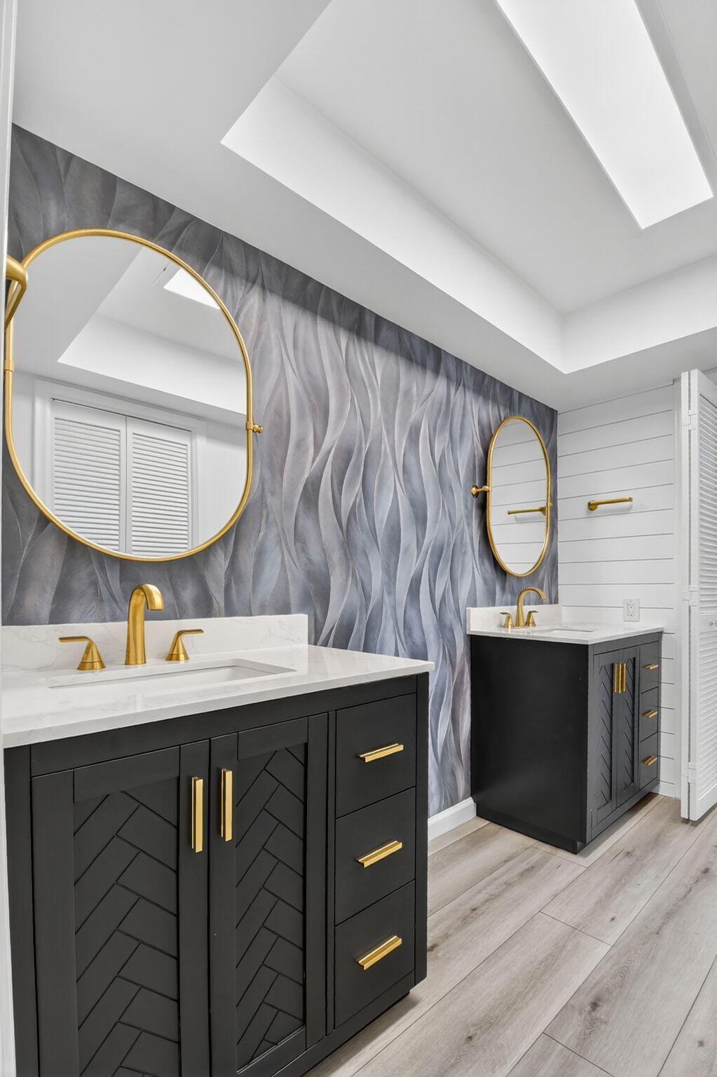 600 Cypress Key Drive Atlantis, FL 33462 - Photo 28 of 43 a kitchen with a sink a stove and a mirror