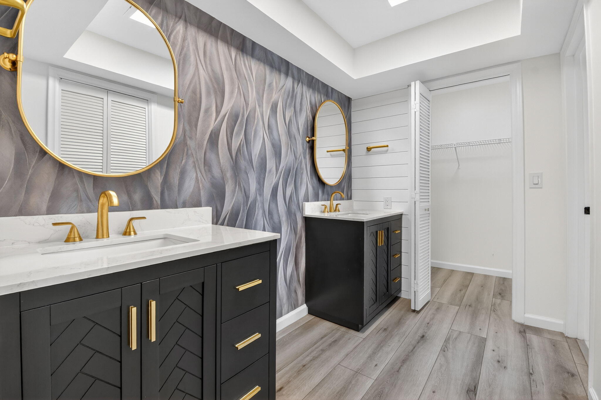 600 Cypress Key Drive Atlantis, FL 33462 - Photo 29 of 43 a bathroom with a sink and a mirror