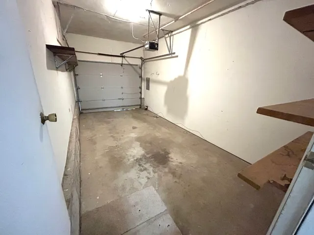 a view of a room with racks on the wall