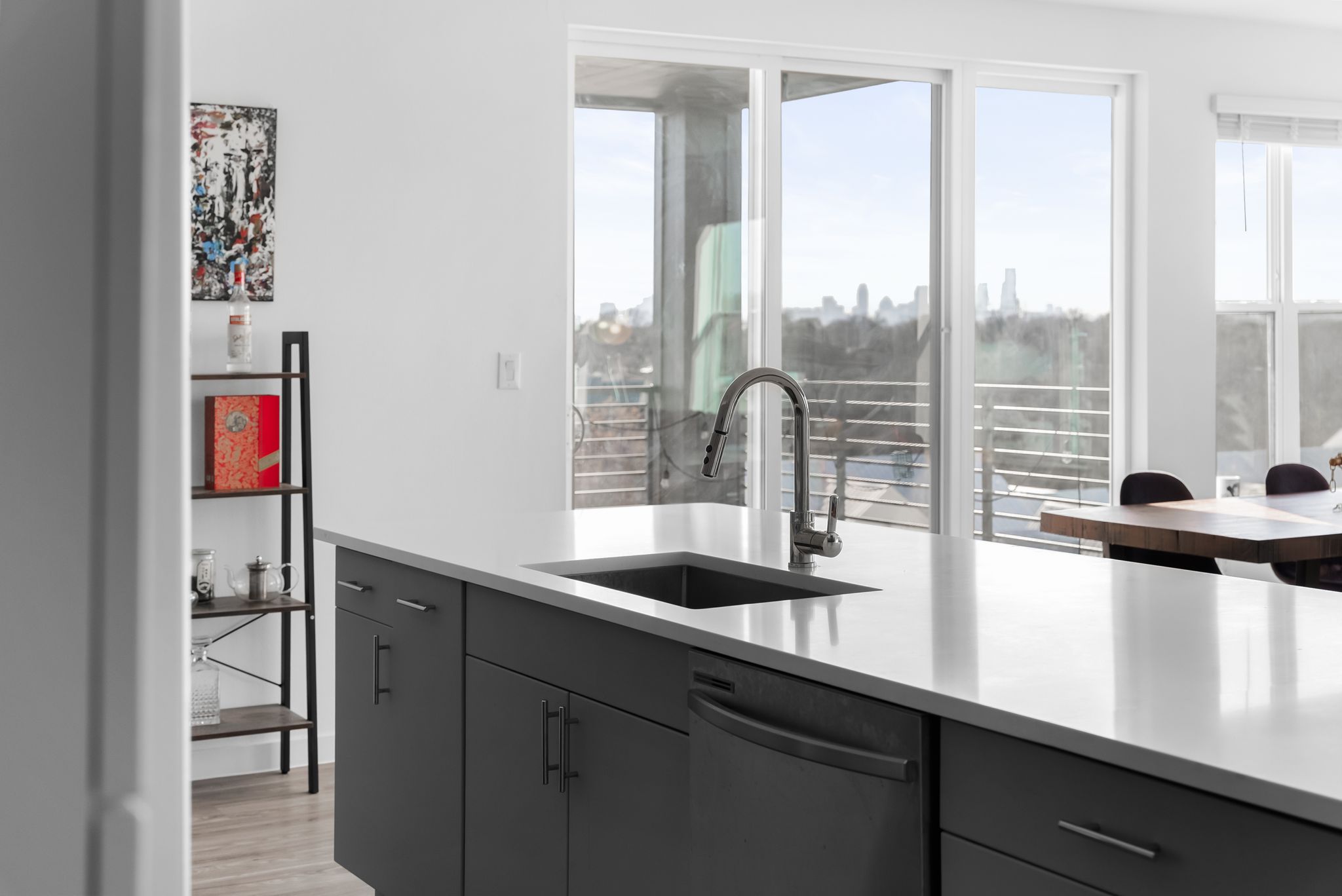 4801 Springdale Road, Unit 2410 Austin, TX 78723 - Photo 4 of 33 Entertain & cook while looking at the skyline! Kitchen open to living and dining.
