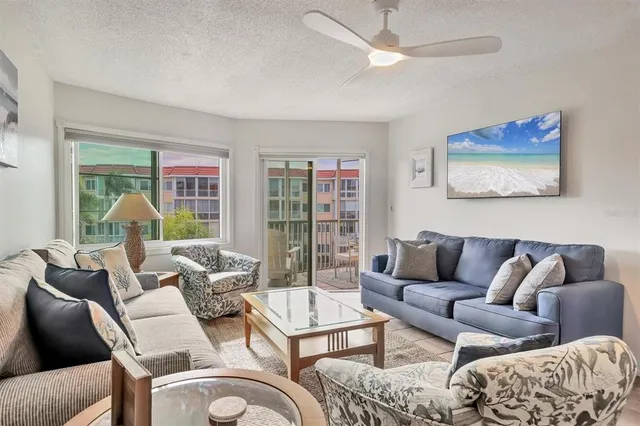 a kitchen with stainless steel appliances granite countertop a sink and stove top oven
