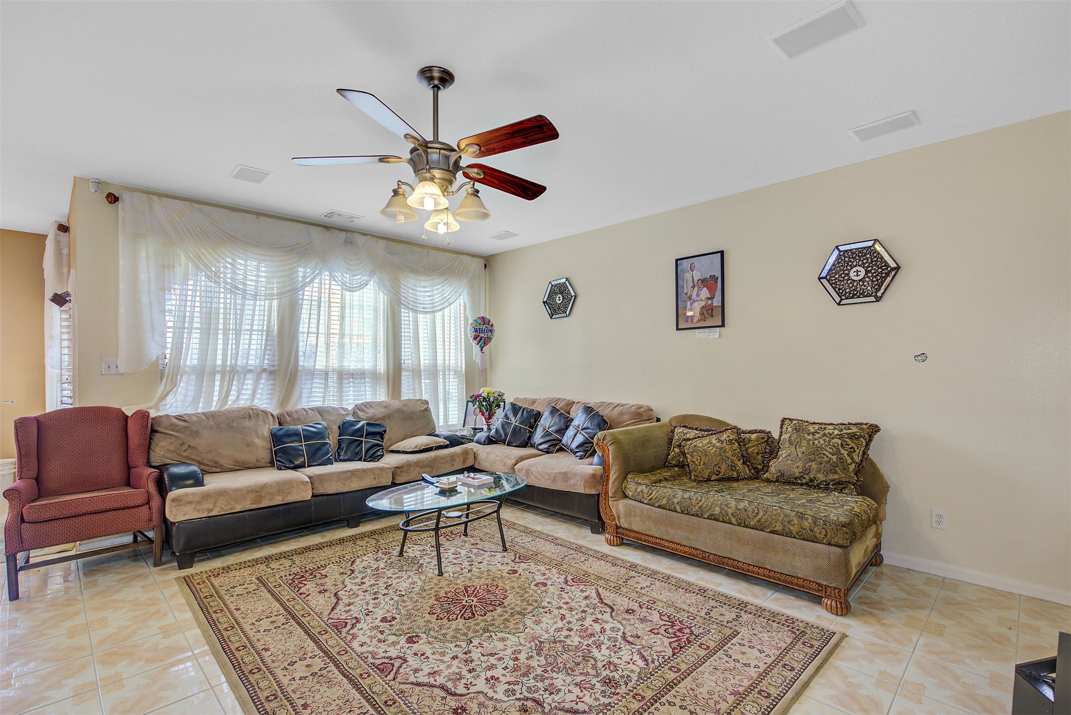 29642 Legends Green Drive Spring, TX 77386 - Photo 13 of 44 a living room with furniture ceiling fan and a rug