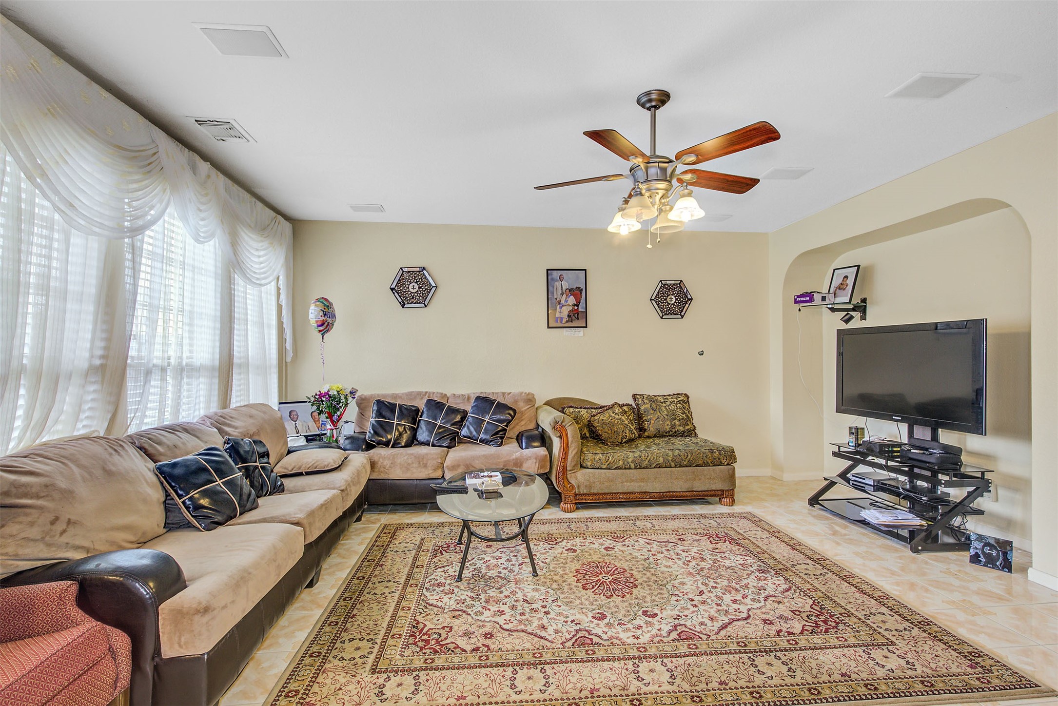 29642 Legends Green Drive Spring, TX 77386 - Photo 14 of 44 a living room with furniture a flat screen tv and a window