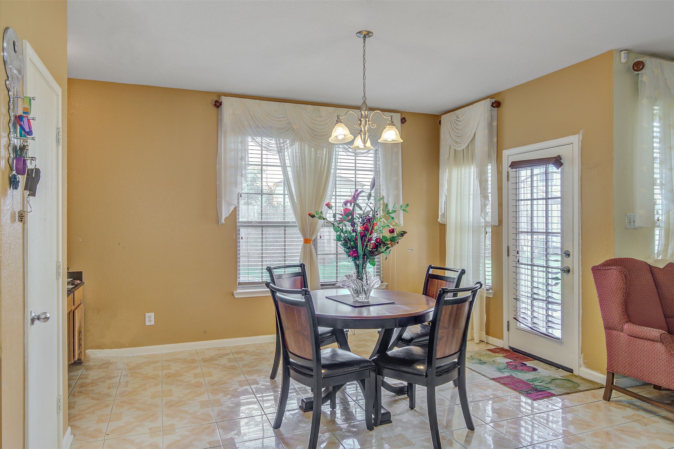 29642 Legends Green Drive Spring, TX 77386 - Photo 16 of 44 a view of a dining room with furniture and chandelier