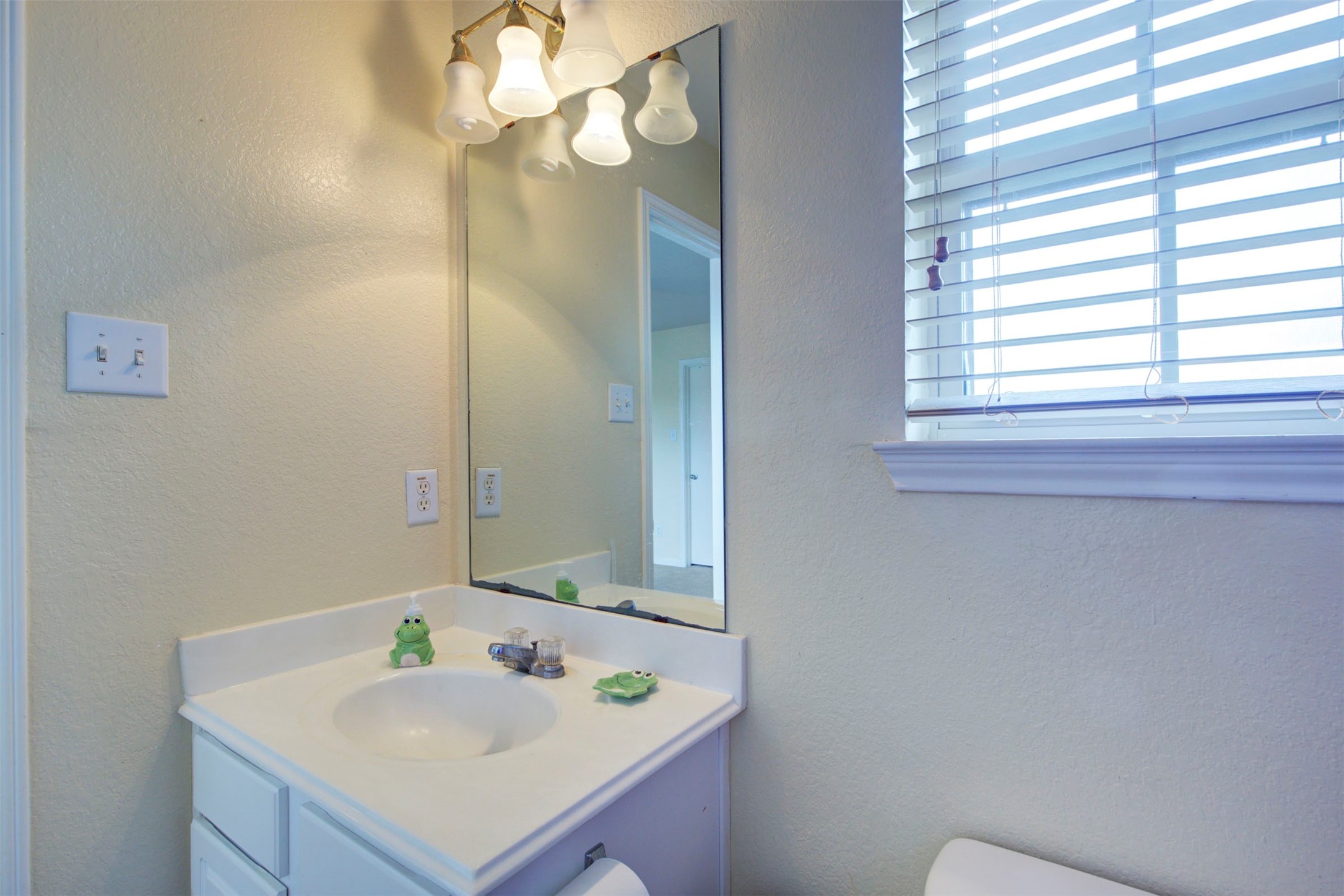 29642 Legends Green Drive Spring, TX 77386 - Photo 29 of 44 a bathroom with a sink and a mirror