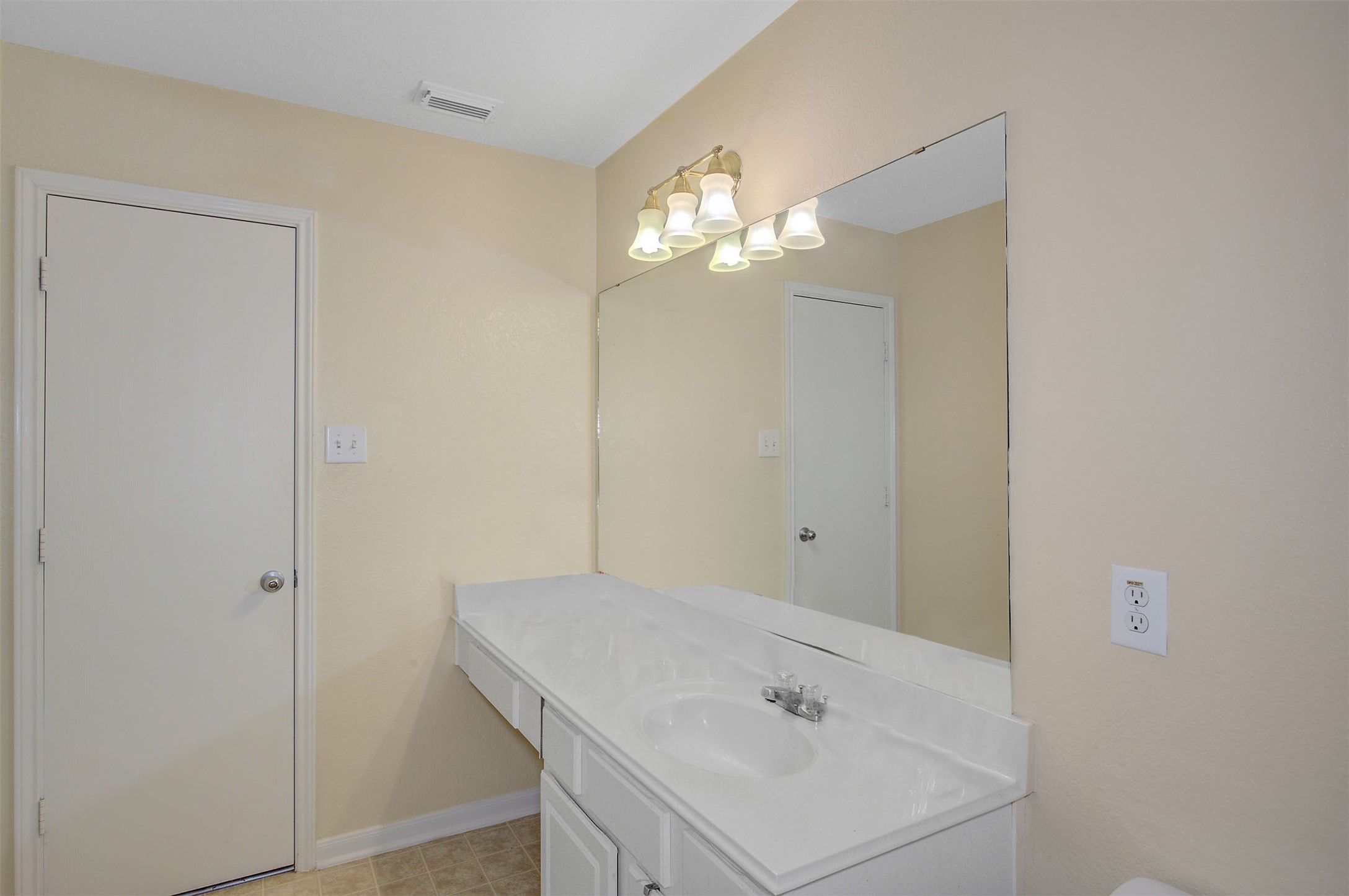 29642 Legends Green Drive Spring, TX 77386 - Photo 32 of 44 a bathroom with a sink and a mirror