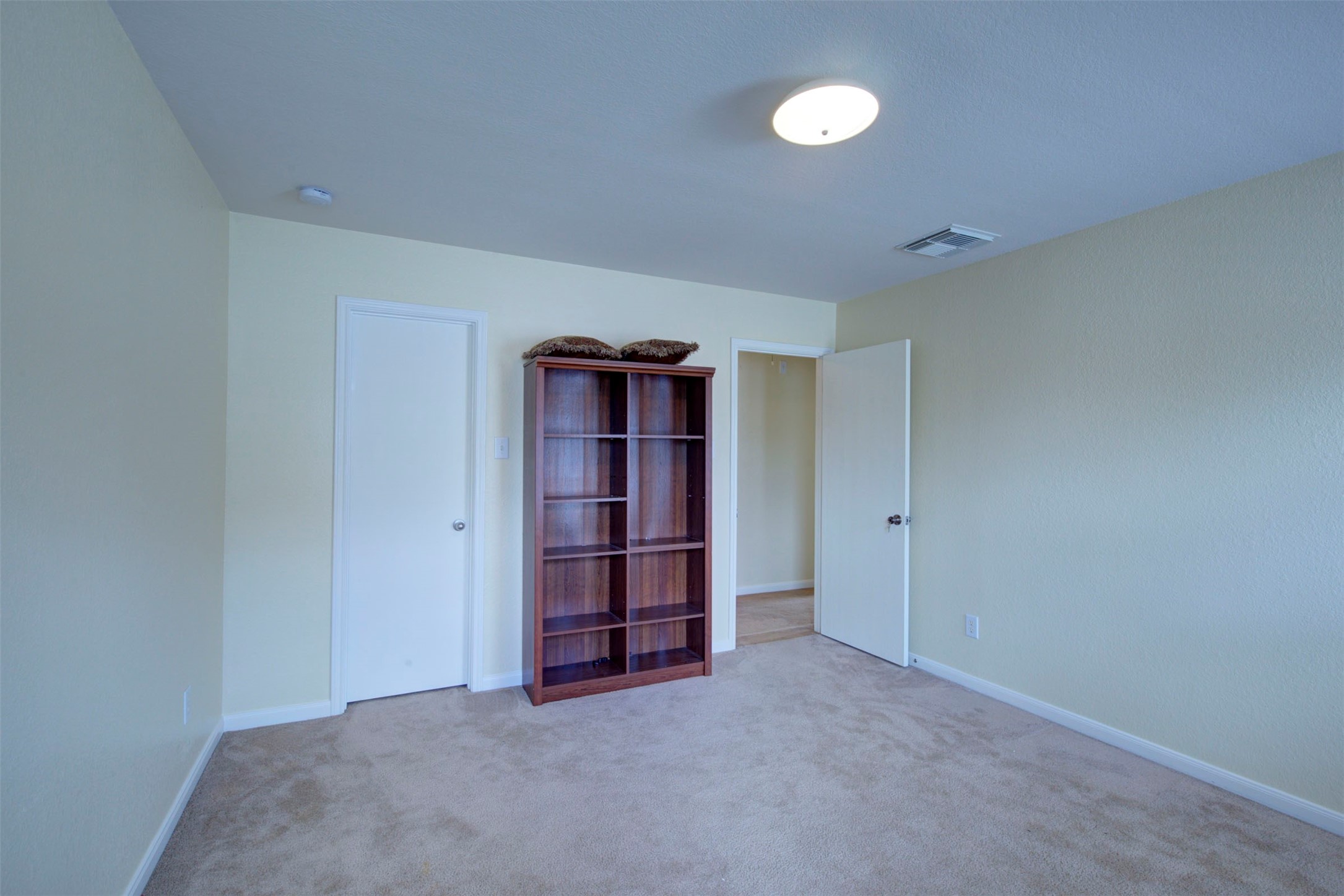 29642 Legends Green Drive Spring, TX 77386 - Photo 38 of 44 an empty room with closet and cabinet