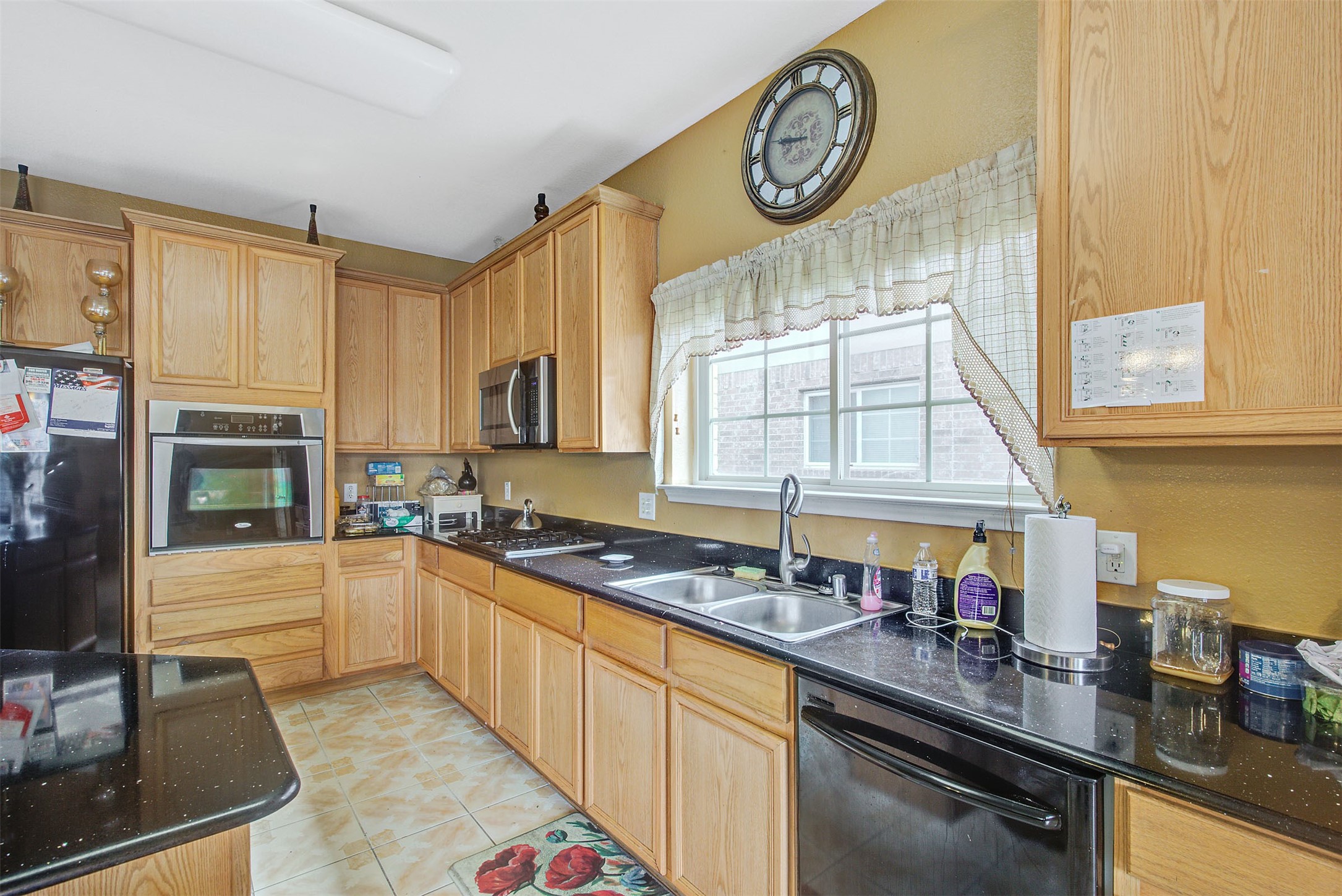 29642 Legends Green Drive Spring, TX 77386 - Photo 8 of 44 a kitchen with a sink cabinets and window