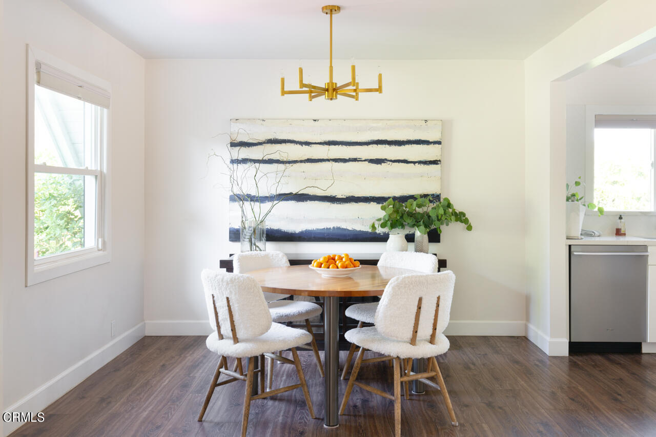 4105 Aralia Road Altadena, CA 91001 - Photo 11 of 41 a view of a dining room with furniture window and wooden floor
