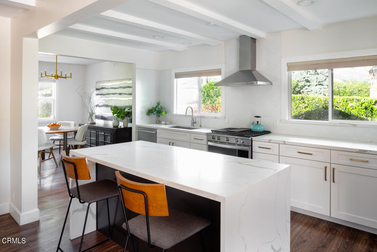 4105 Aralia Road Altadena, CA 91001 - Photo 12 of 41 a kitchen with a dining table chairs and window