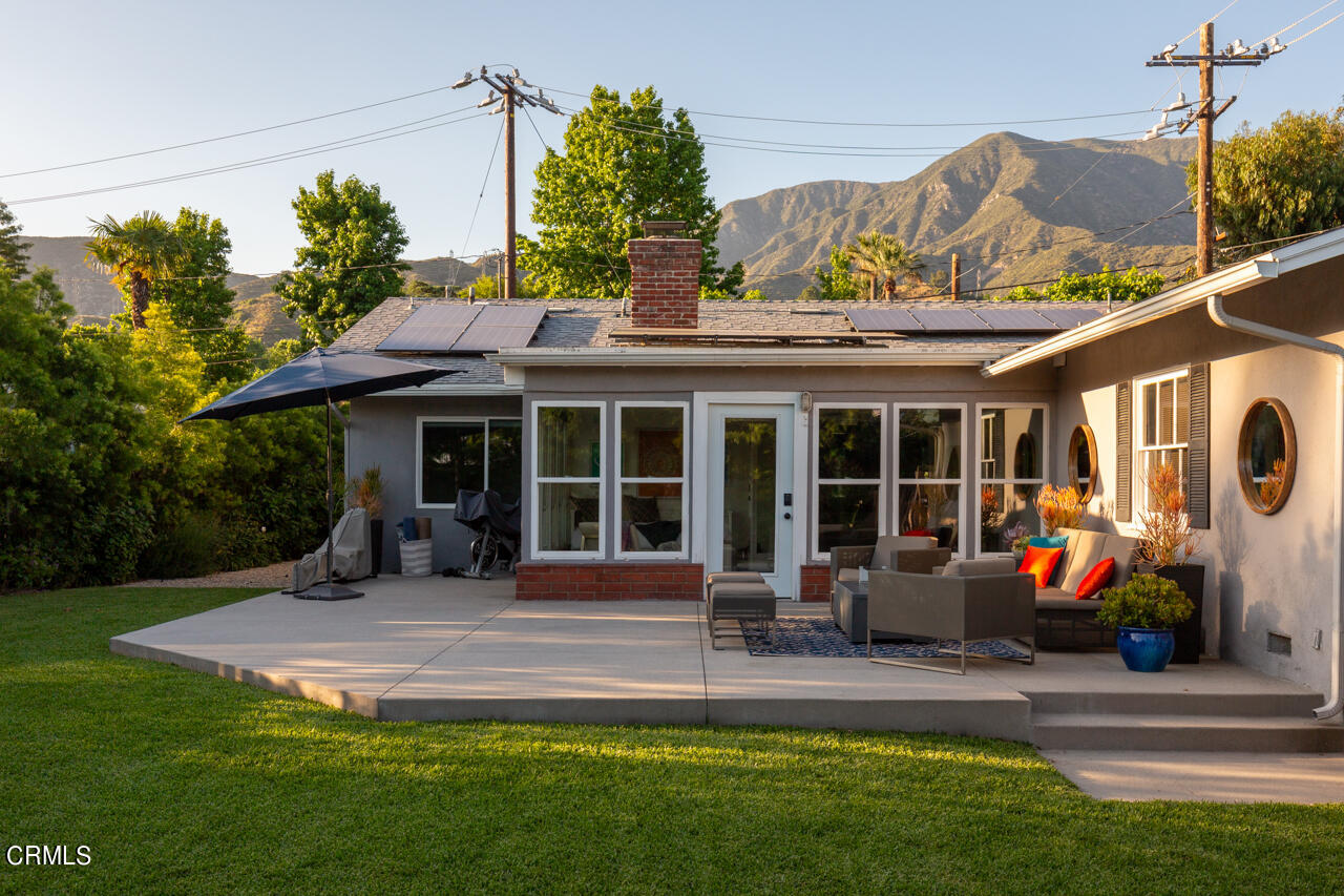 4105 Aralia Road Altadena, CA 91001 - Photo 29 of 41 a view of a house with sitting area and garden