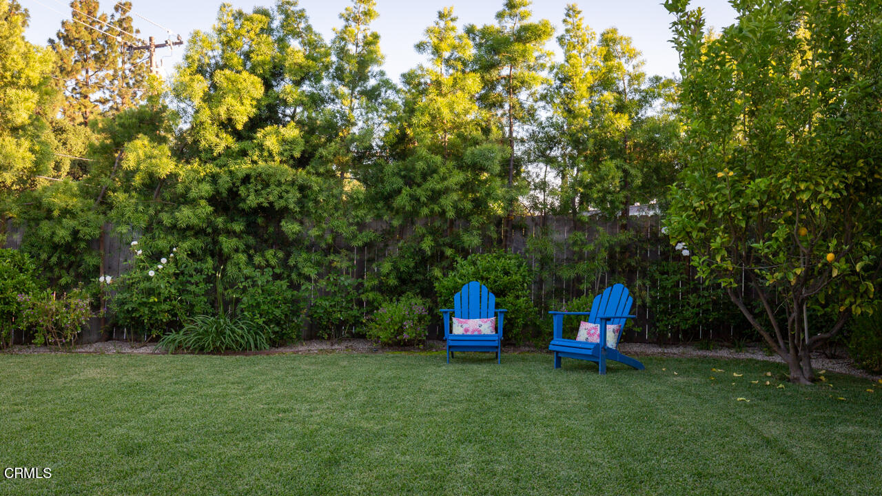 4105 Aralia Road Altadena, CA 91001 - Photo 32 of 41 a backyard of a house with table and chairs