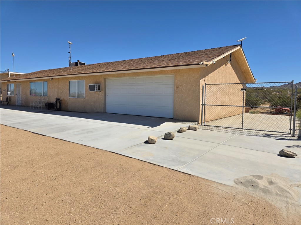 51063 Joshua Tree Road Johnson Valley, CA 92285 - Photo 2 of 35 Giant Garage, over 1000 square feet, enough for several cars, bikes, toys
