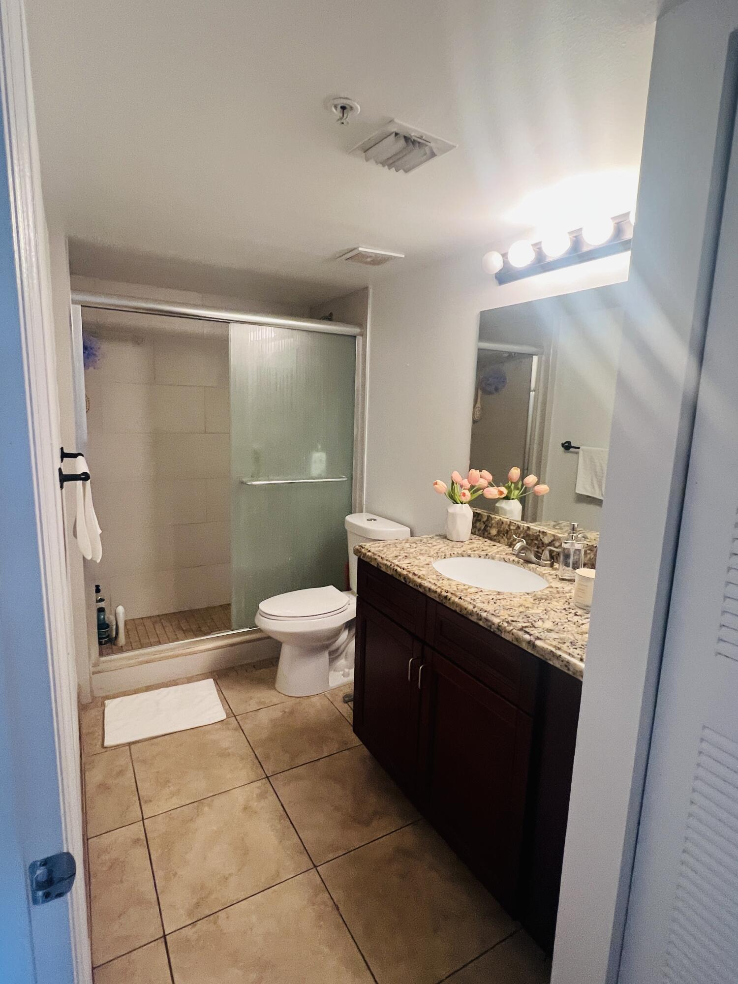 5025 Wiles Road, Unit 305 Coconut Creek, FL 33073 - Photo 12 of 22 Master Bath