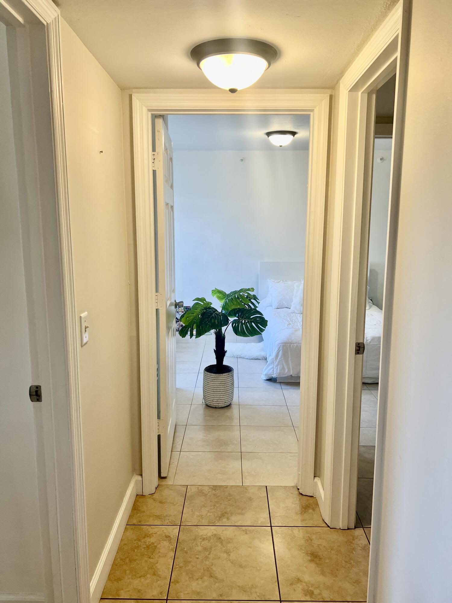 5025 Wiles Road, Unit 305 Coconut Creek, FL 33073 - Photo 19 of 22 Hallway to 2nd&3rd Bedroom