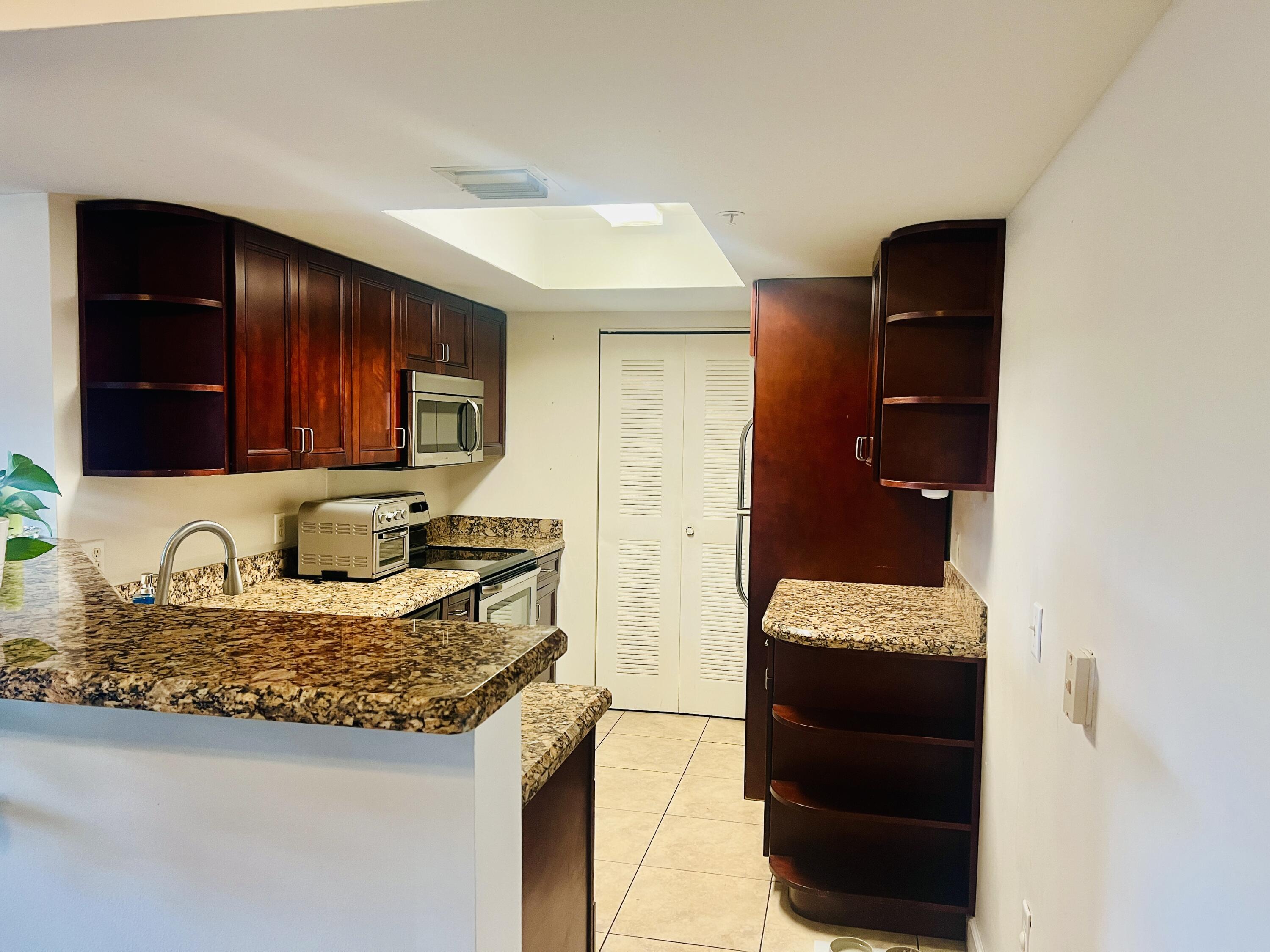 5025 Wiles Road, Unit 305 Coconut Creek, FL 33073 - Photo 5 of 22 Kitchen