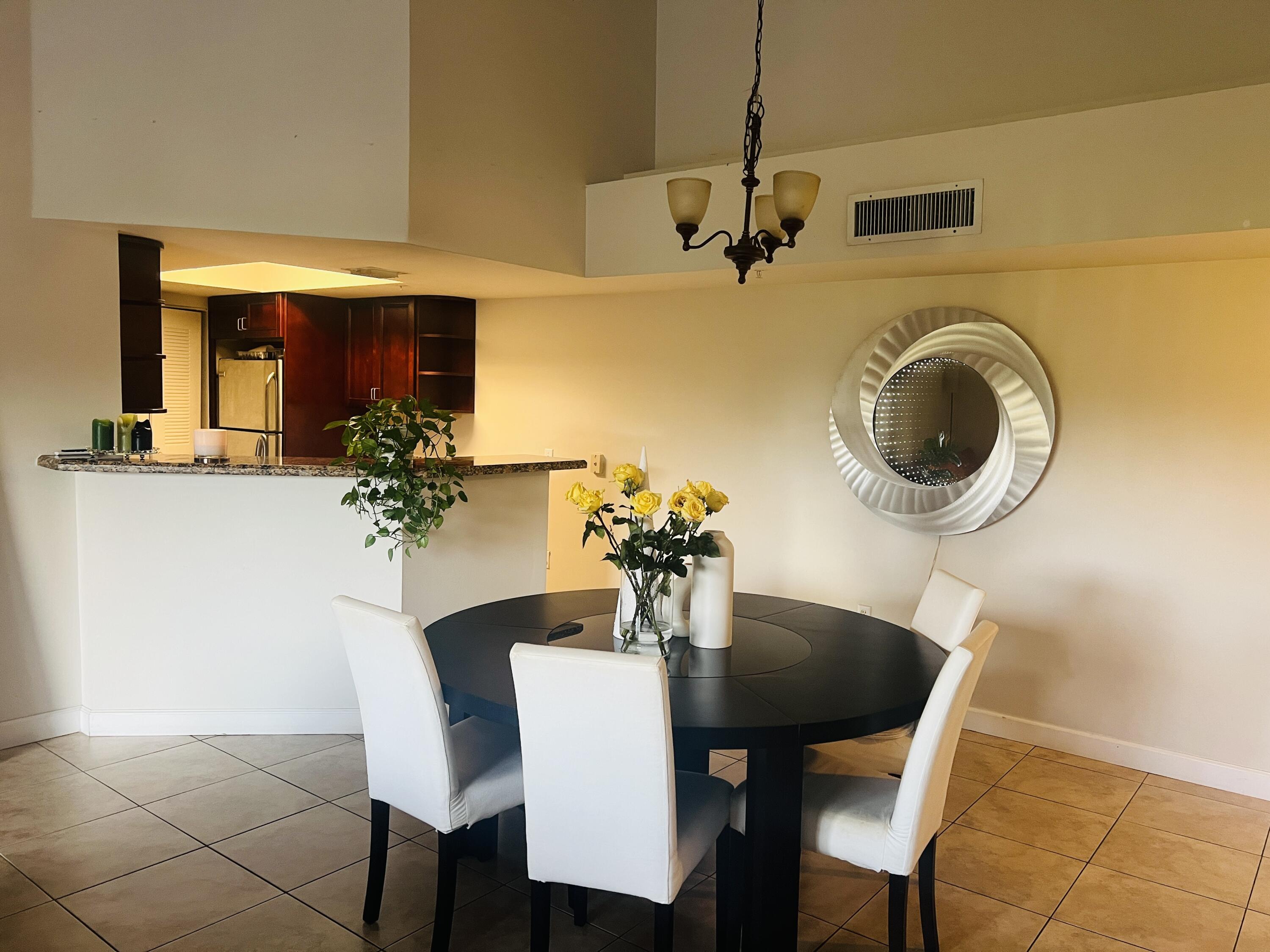 5025 Wiles Road, Unit 305 Coconut Creek, FL 33073 - Photo 8 of 22 Dining Room