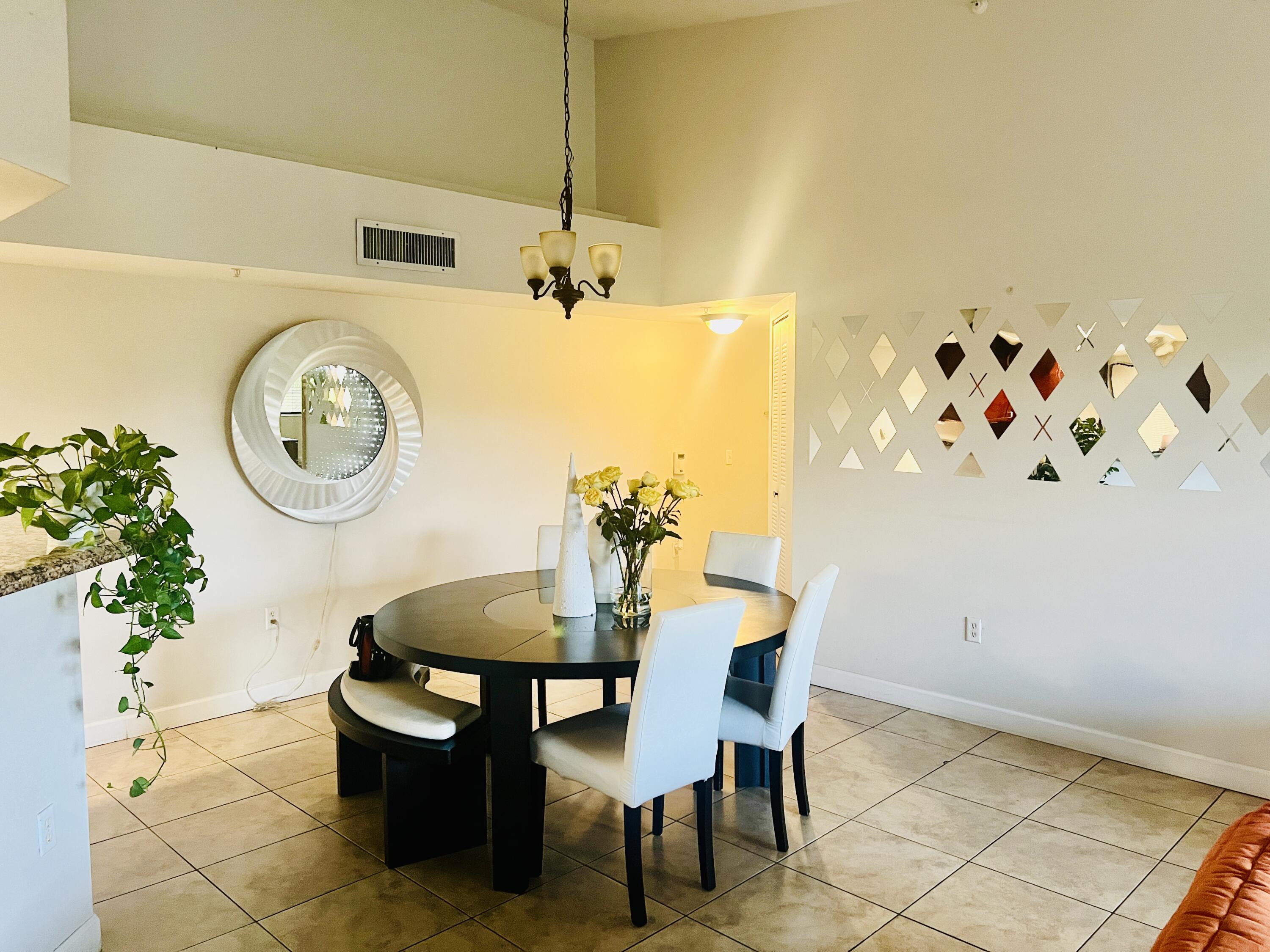5025 Wiles Road, Unit 305 Coconut Creek, FL 33073 - Photo 9 of 22 Dining Room