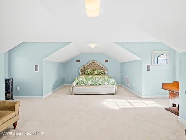 a view of livingroom with furniture and closet