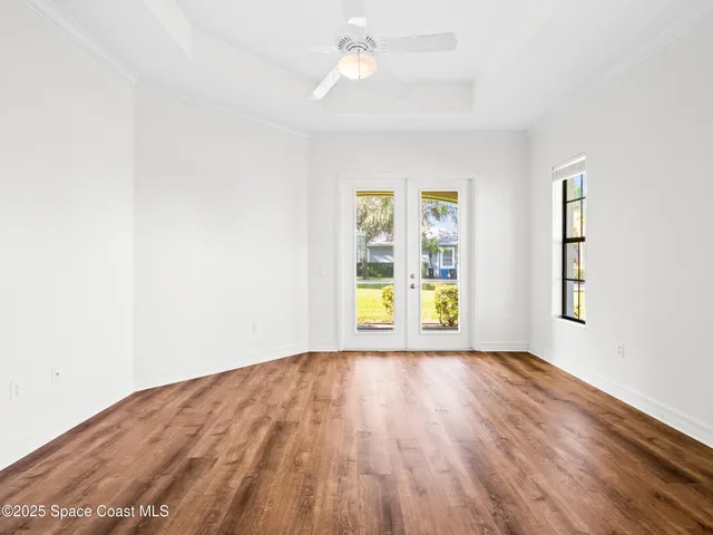 a view of an empty room and window
