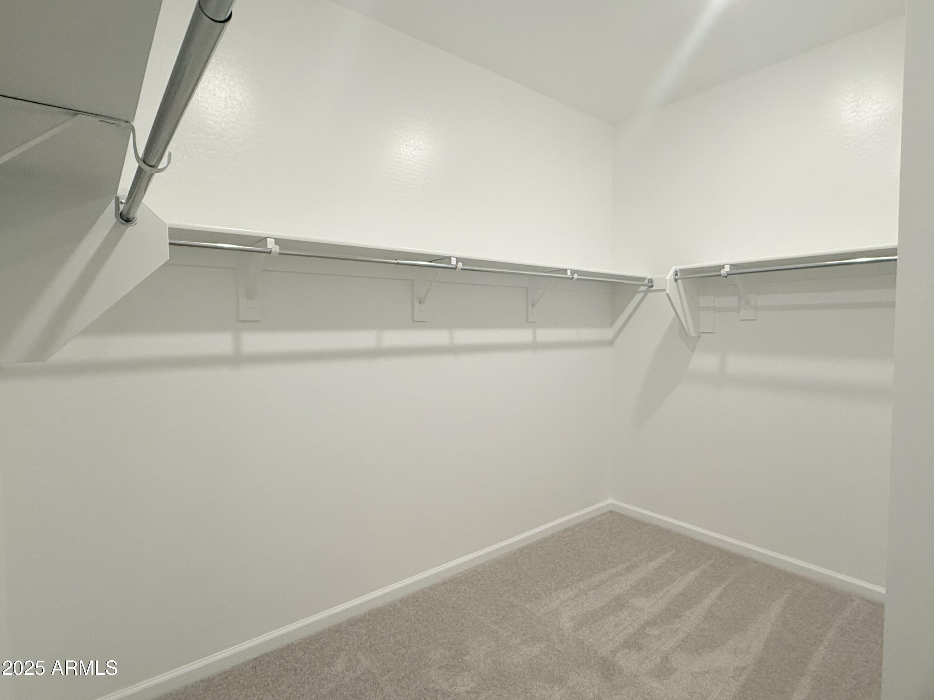 2487 Rolling Pr Lane San Tan Valley, AZ 85140 - Photo 18 of 45 018 Primary Walk-In-Closet