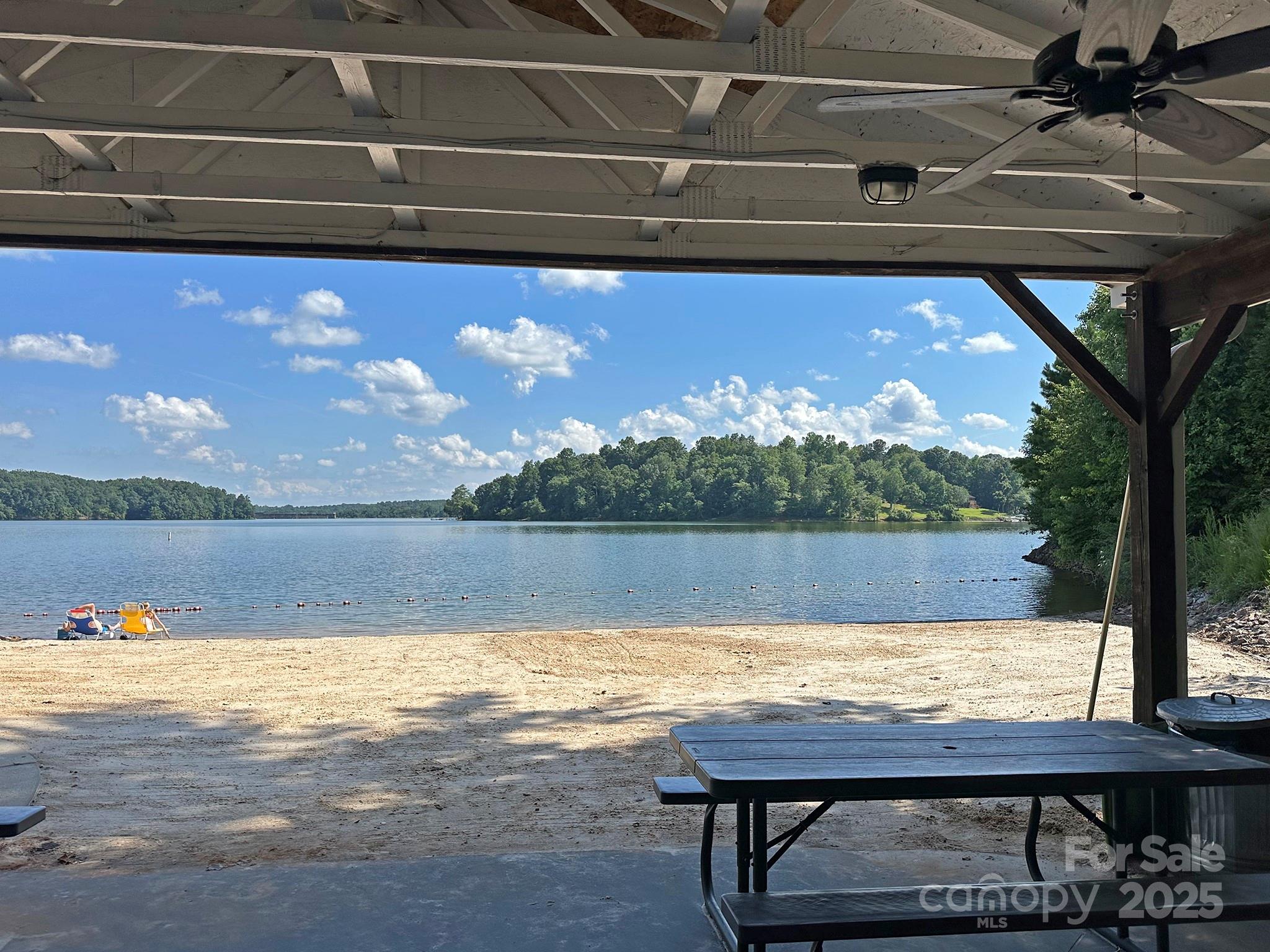 547 Stewart Rock Road Stony Point, NC 28678 - Photo 21 of 29 a view of swimming pool from a lake