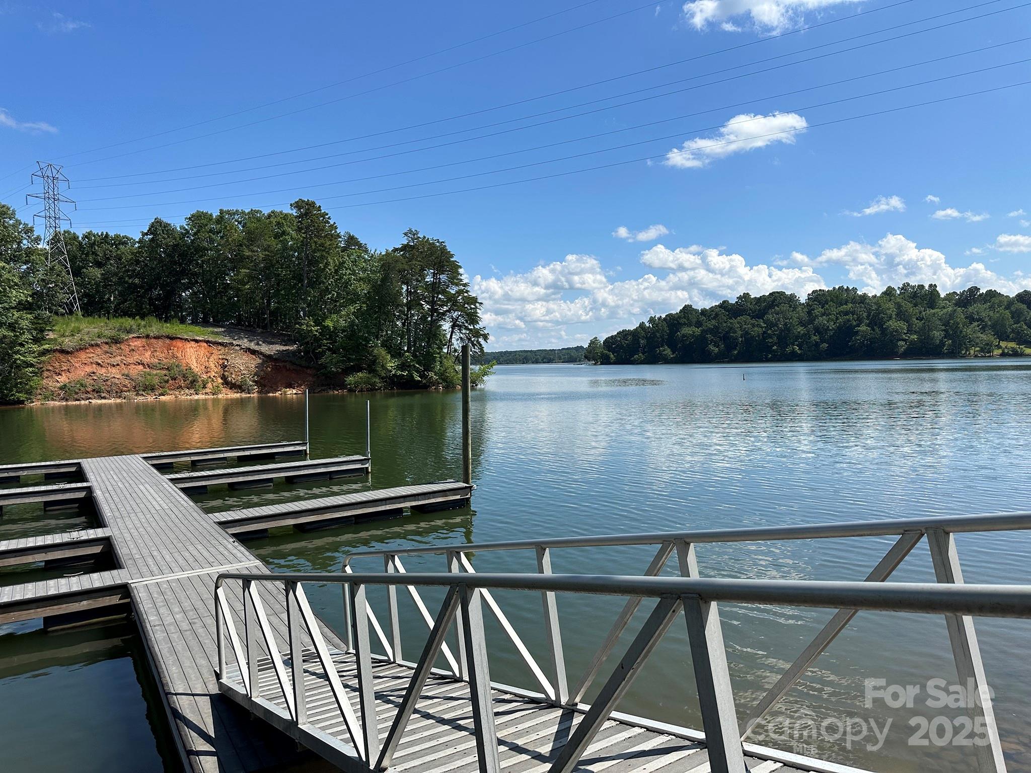 547 Stewart Rock Road Stony Point, NC 28678 - Photo 26 of 29 a view of a chairs and table on the terrace