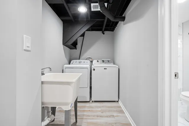 a utility room with dryer and washer