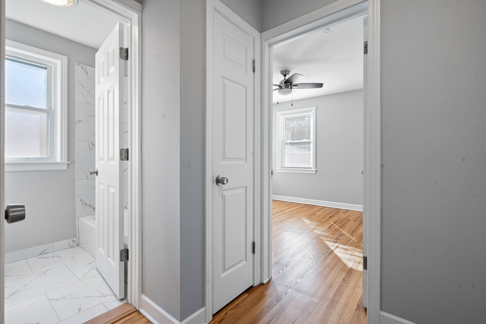 604 Dodge Avenue Evanston, IL 60202 - Photo 9 of 26 a view of hallway with wooden floor