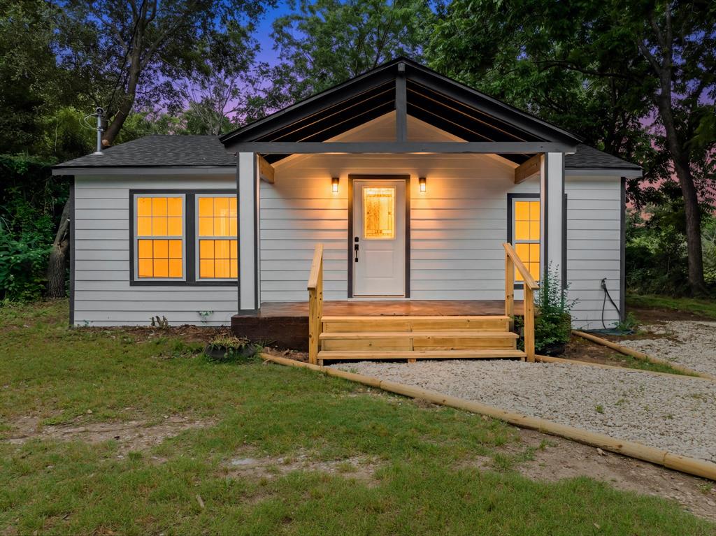 3313 South 3rd Street Waco, TX 76706 - Photo 1 of 28 a front view of a house with a yard