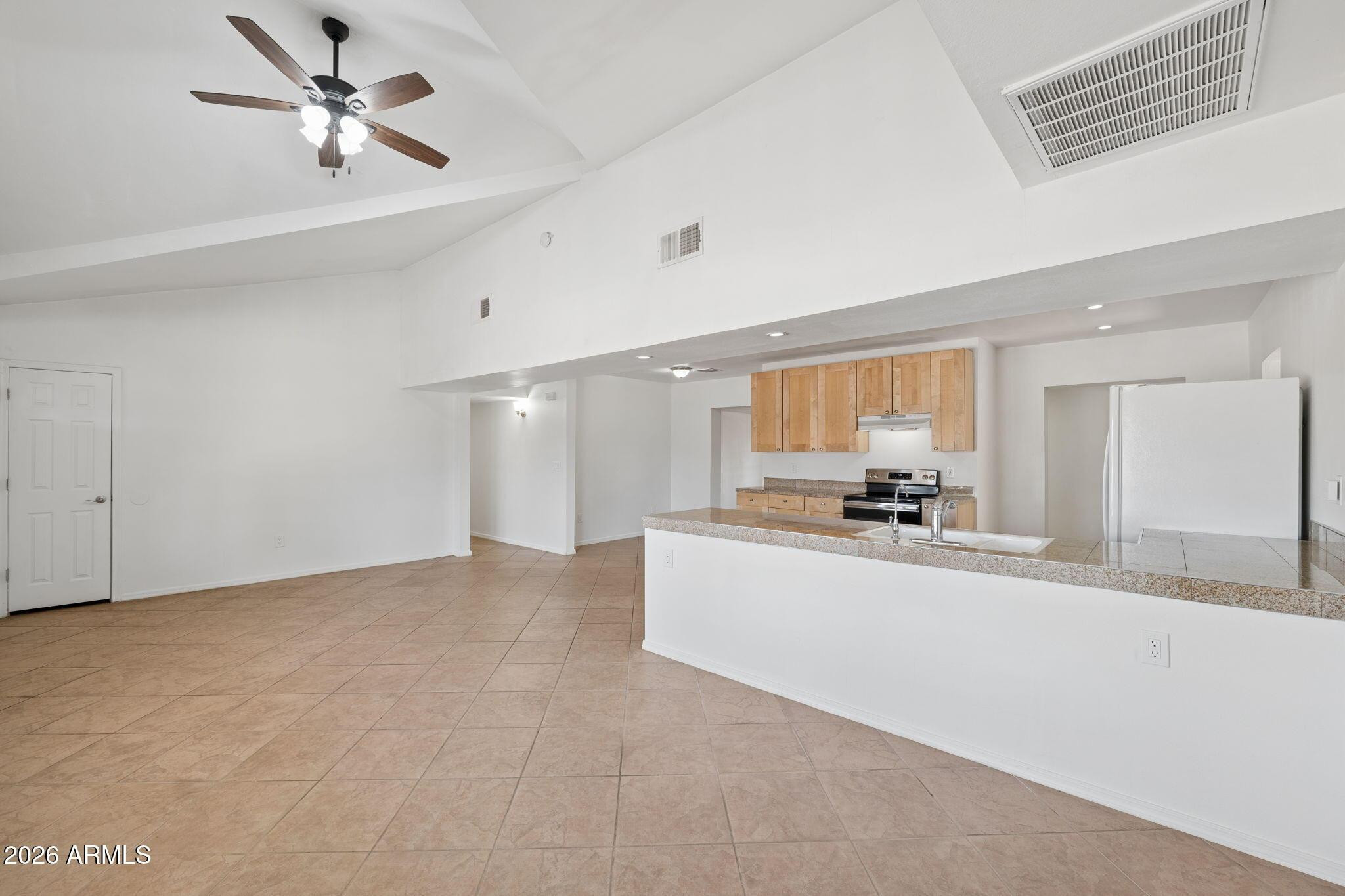 7 South Catalina Street Gilbert, AZ 85233 - Photo 6 of 34 a view of a livingroom with a kitchen