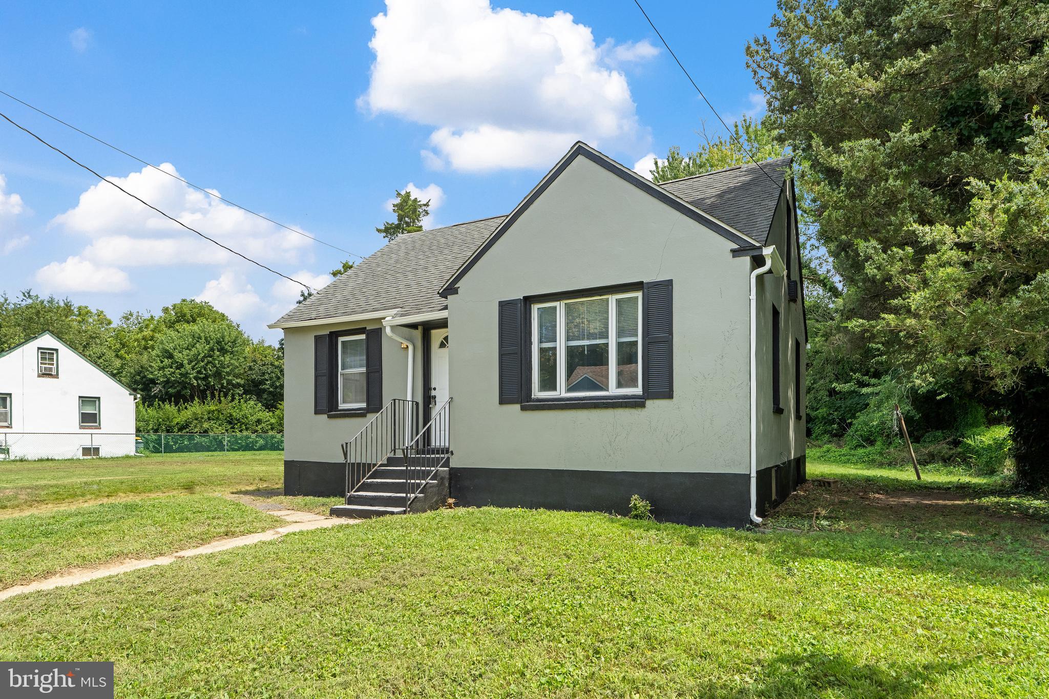 a house view with a garden space