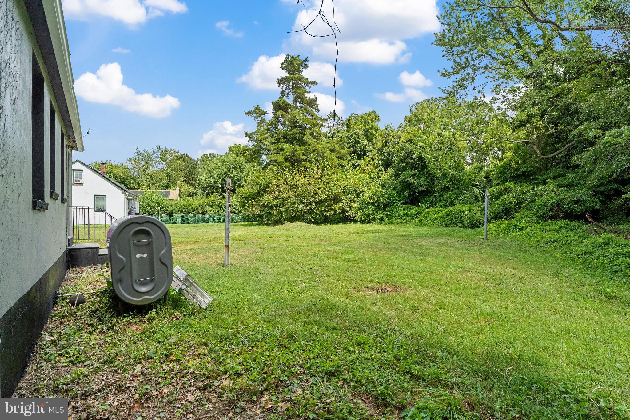 22 Davis Avenue Salem, NJ 08079 - Photo 24 of 25 a backyard of a house with lots of green space
