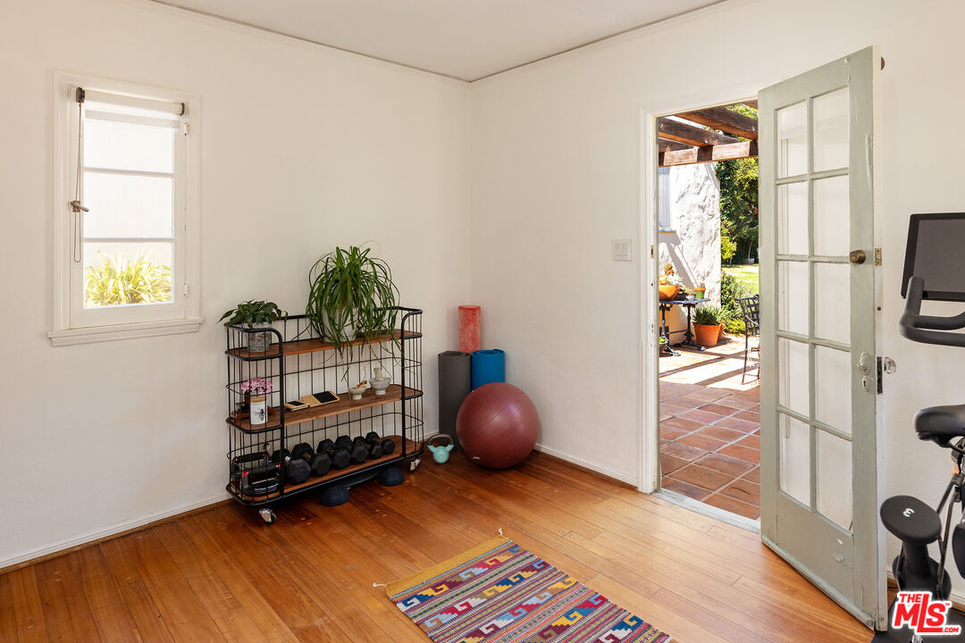 10346 Rochester Avenue Los Angeles, CA 90024 - Photo 12 of 19 a bedroom with furniture and a window
