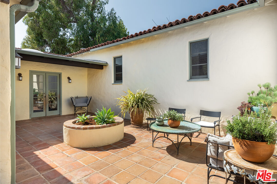 10346 Rochester Avenue Los Angeles, CA 90024 - Photo 16 of 19 a view of a patio with furniture and potted plants