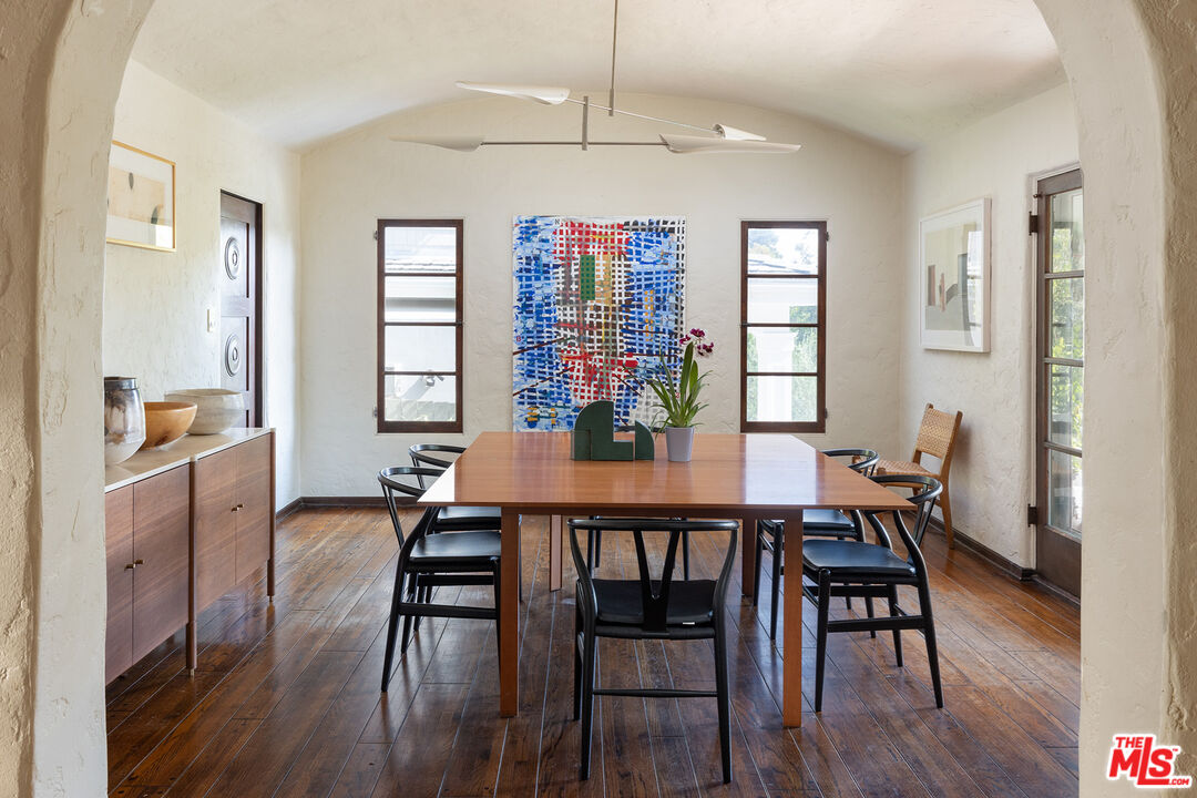 10346 Rochester Avenue Los Angeles, CA 90024 - Photo 5 of 19 a dining room with furniture a chandelier and wooden floor