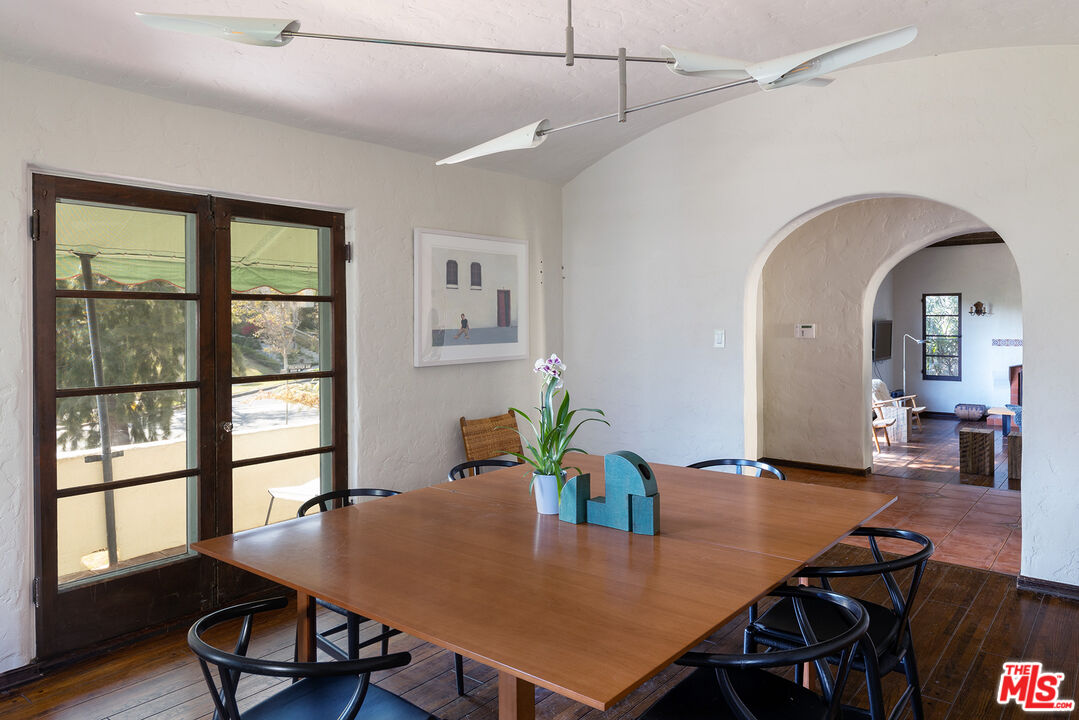 10346 Rochester Avenue Los Angeles, CA 90024 - Photo 6 of 19 a view of a dining room with furniture window and wooden floor