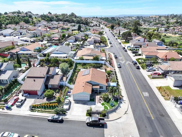 an aerial view of a house with a garden