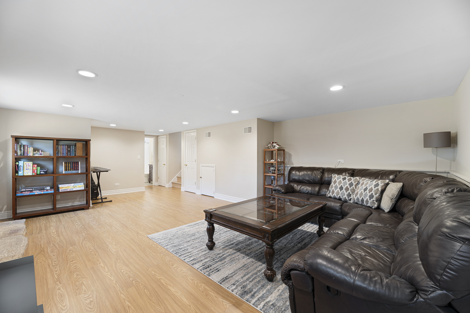 3348 Ralmark Lane Glenview, IL 60026 - Photo 21 of 36 a living room with furniture and a wooden floor
