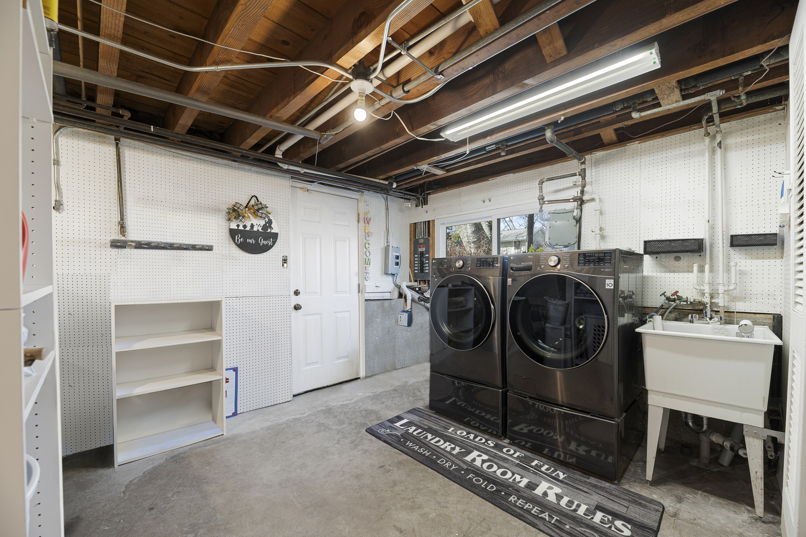 3348 Ralmark Lane Glenview, IL 60026 - Photo 26 of 36 a utility room with dryer washer and stair