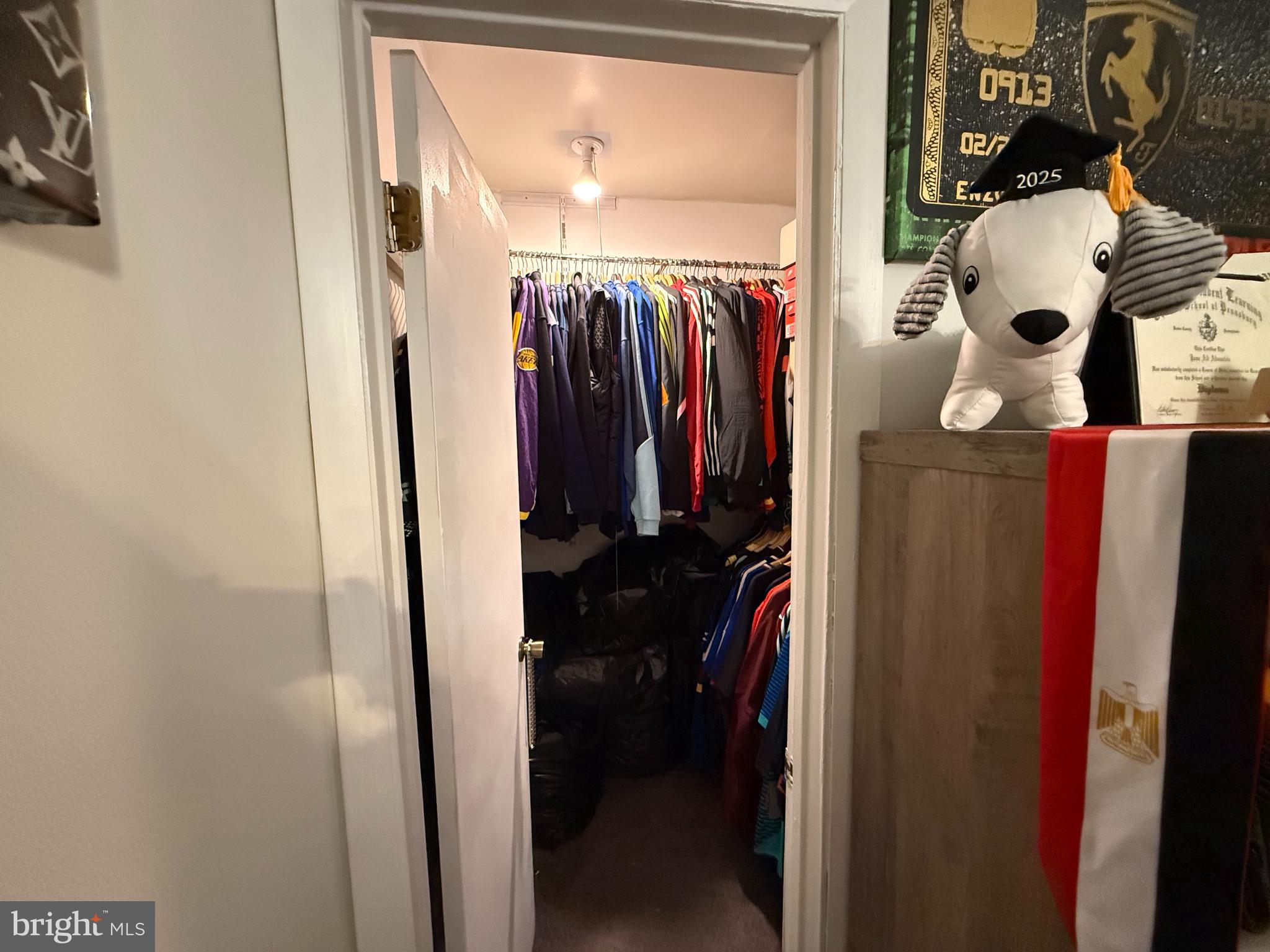 305 Lincoln Avenue Maple Shade, NJ 08052 - Photo 13 of 23 a view of walk in closet with clothes and shoes