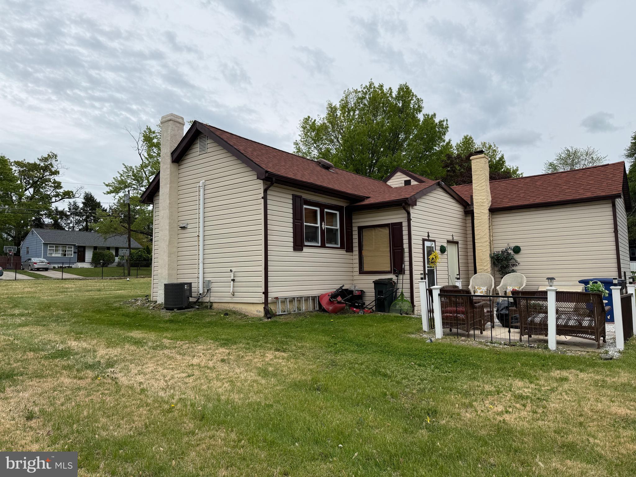 305 Lincoln Avenue Maple Shade, NJ 08052 - Photo 20 of 23 a view of a house with a yard and chairs