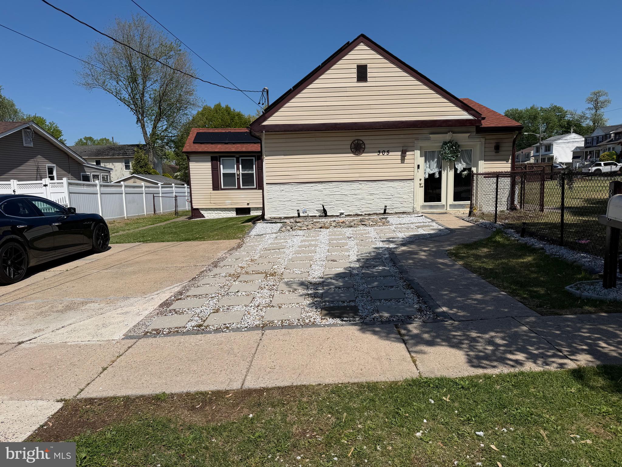 305 Lincoln Avenue Maple Shade, NJ 08052 - Photo 22 of 23 a front view of a house with a yard and garage